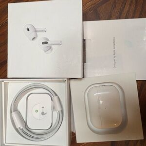 Apple AirPods Pro with White Charging Case and Cable